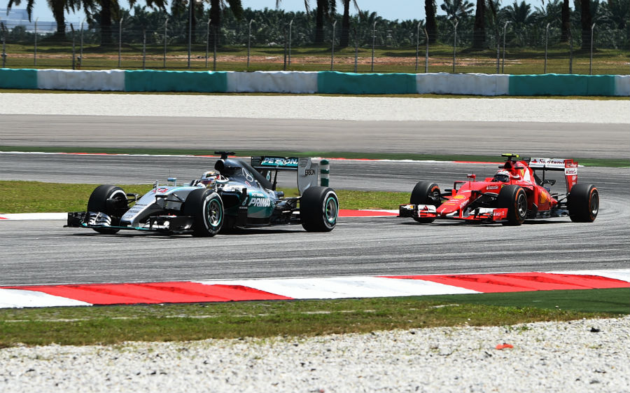 Kimi Raikkonen stalks the Mercedes of Lewis Hamilton in FP2