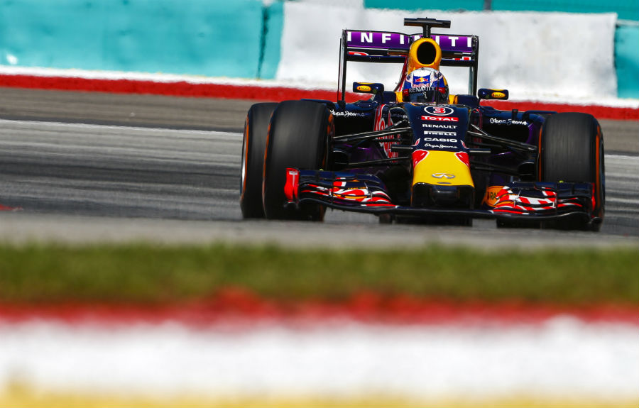 Daniel Ricciardo points his Red Bull towards the apex