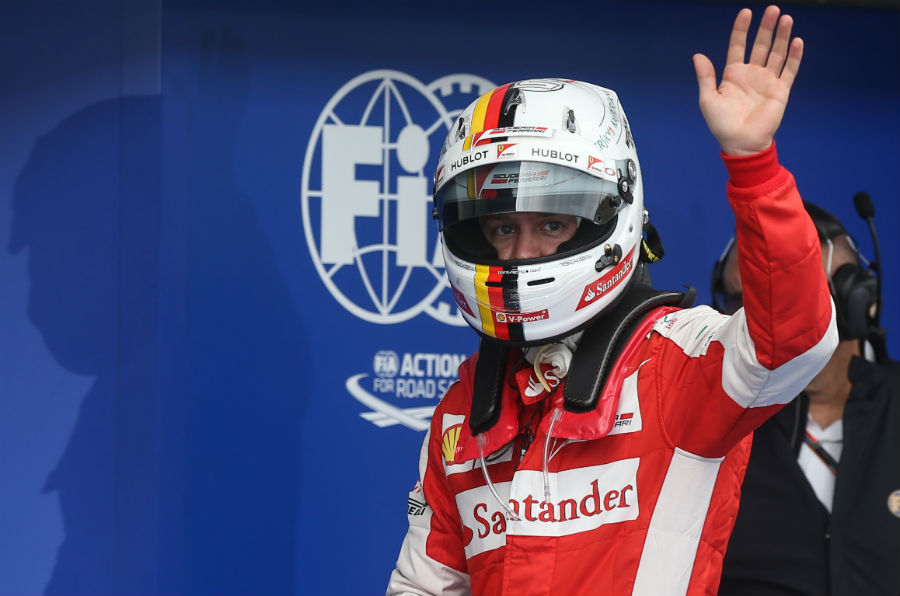 Sebastian Vettel waves to the crowd after qualifying second