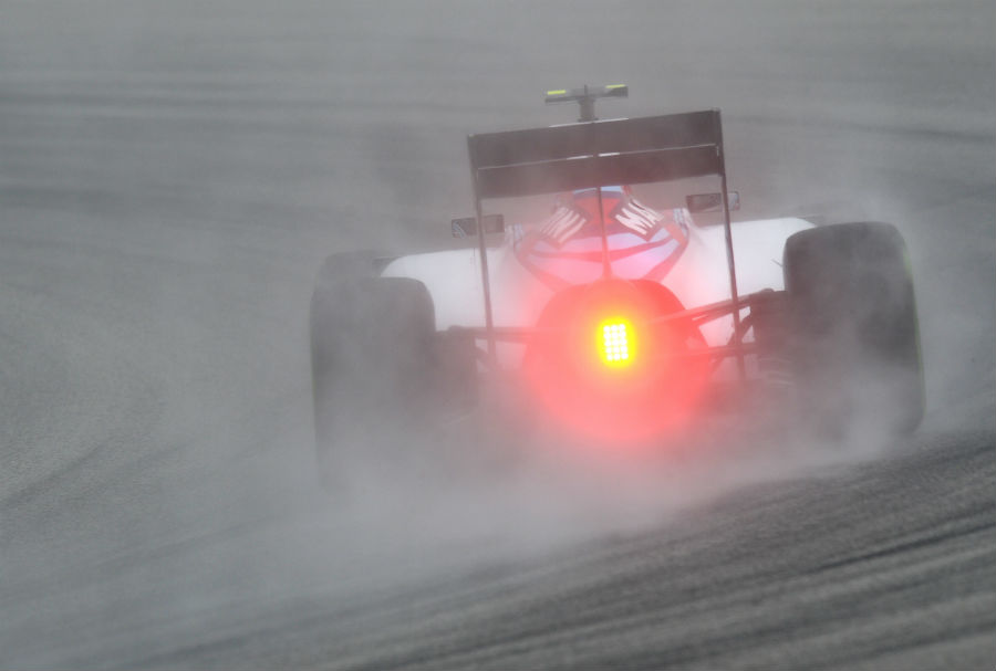 Valtteri Bottas drives through the spray