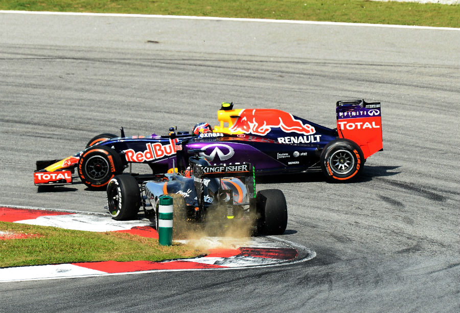 Nico Hulkenberg pitches Daniil Kvyay's Red Bull into a spin at Turn 2