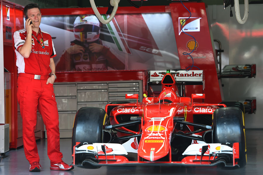 Technical director James Allison stands with the Ferrari SF15-T