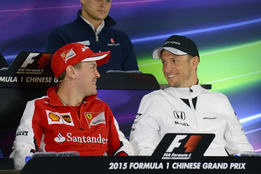 Vettel and Button share a joke at the Press Conference