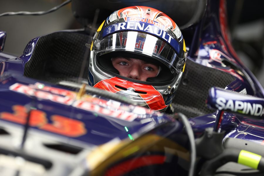 Max Verstappen sits on the cockpit