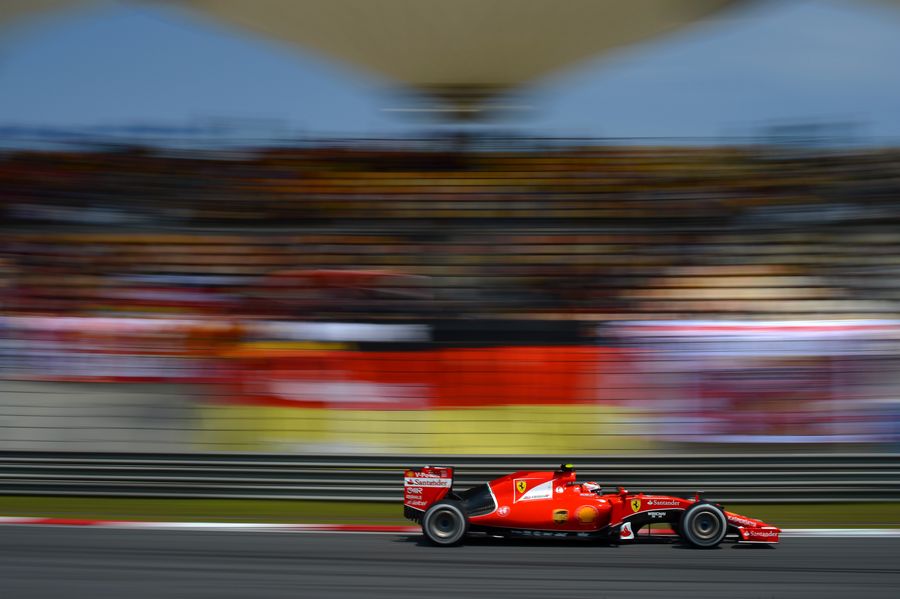 Kimi Raikkonen puts the SF15-T through its paces during FP3