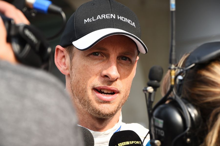 Jenson Button talks with media