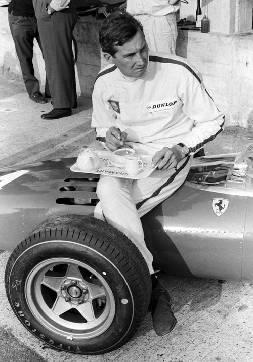Mike Parkes takes afternoon tea at the 1966 Italian Grand Prix