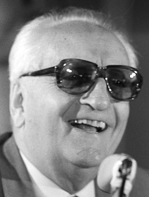 Enzo Ferrari at a press conference in 1975