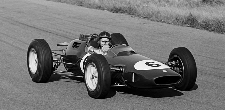 Lotus' Jim Clark celebrates after winning the 1963 Dutch Grand Prix