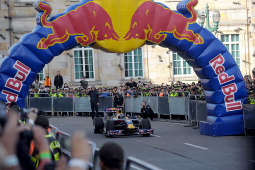 David Coulthard drives a Red Bull car during a display in Bogota
