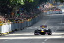 David Coulthard drives a Red Bull car during a display in Bogota