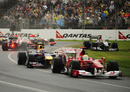 Mark Webber and Felipe Massa escape the first corner melee