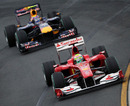 Felipe Massa keeps the Red Bull of Mark Webber behind him