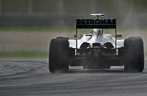 Nico Rosberg out in wet conditions