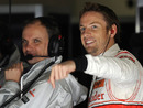 A happy Jenson Button after setting the fastest time of the morning
