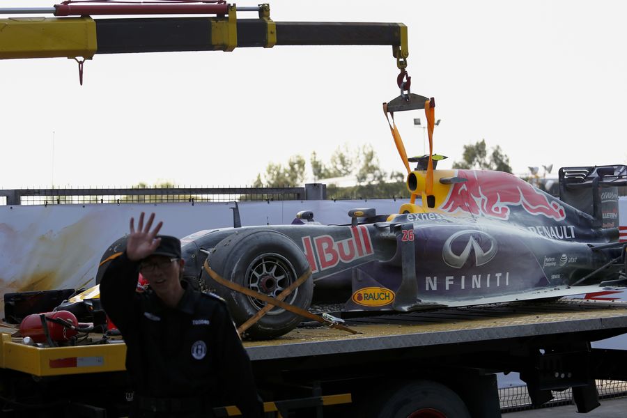 The Red Bull RB11 of race retiree Daniil Kvyat