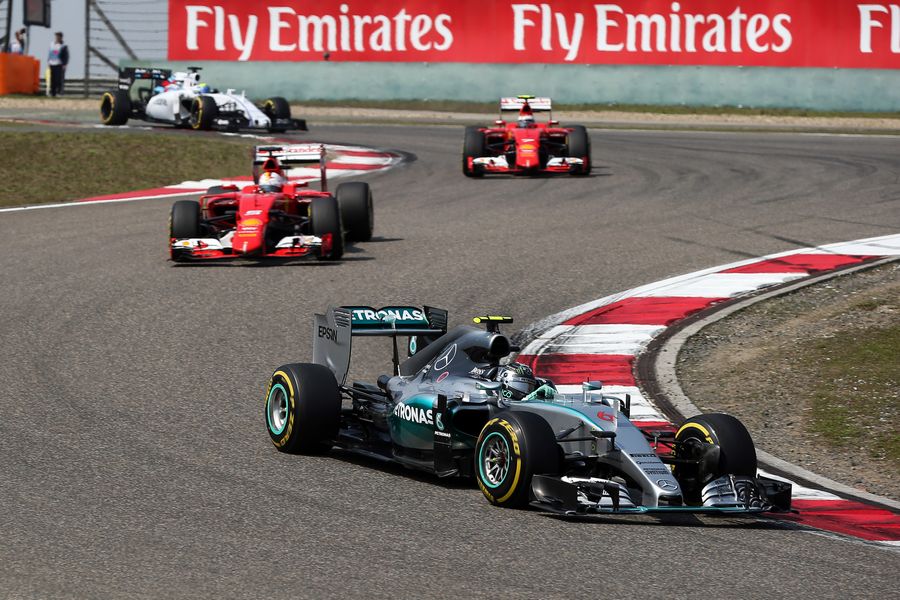 Nico Rosberg leads two Ferraris