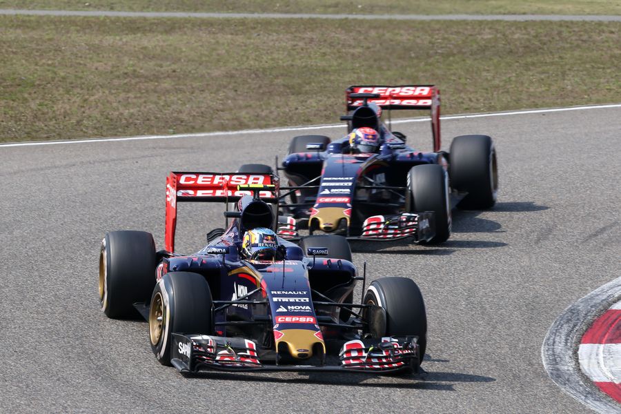 Carlos Sainz and Max Verstappen battle for a position