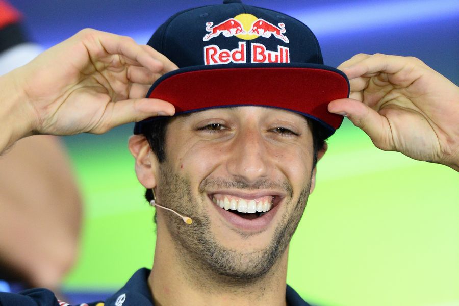 Daniel Ricciardo laughs during the driver press conference