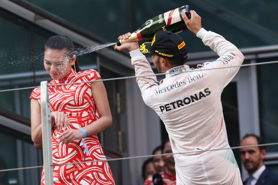Race-winner Lewis Hamilton on the podium