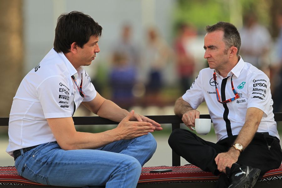 Toto Wolff and Paddy Lowe chat in the paddock