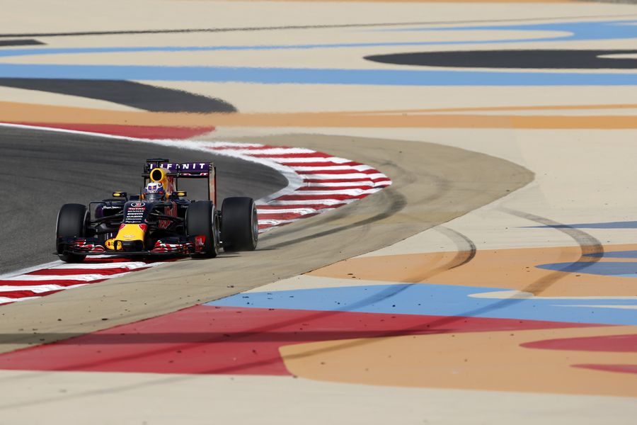 Daniel Ricciardo runs the kerbs in his Red Bull