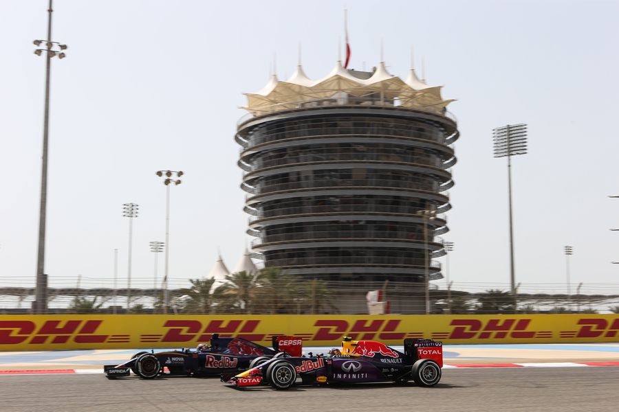 Max Verstappen leads Red Bull's Daniil Kvyat through a corner
