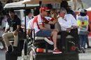 Sebastian Vettel and Bernie Ecclestone chats in the back of the cart