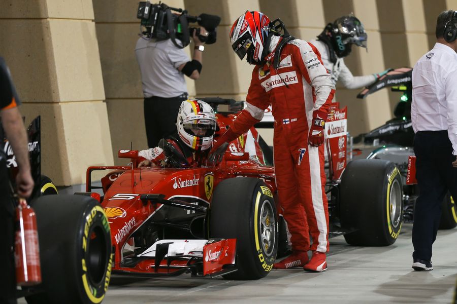 Kimi Raikkonen congratulates Sebastian Vettel for the second in qualifying