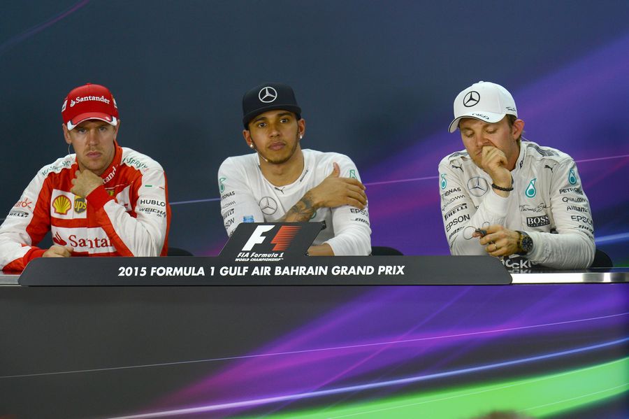 The top three drivers look on at the press conference after qualifying