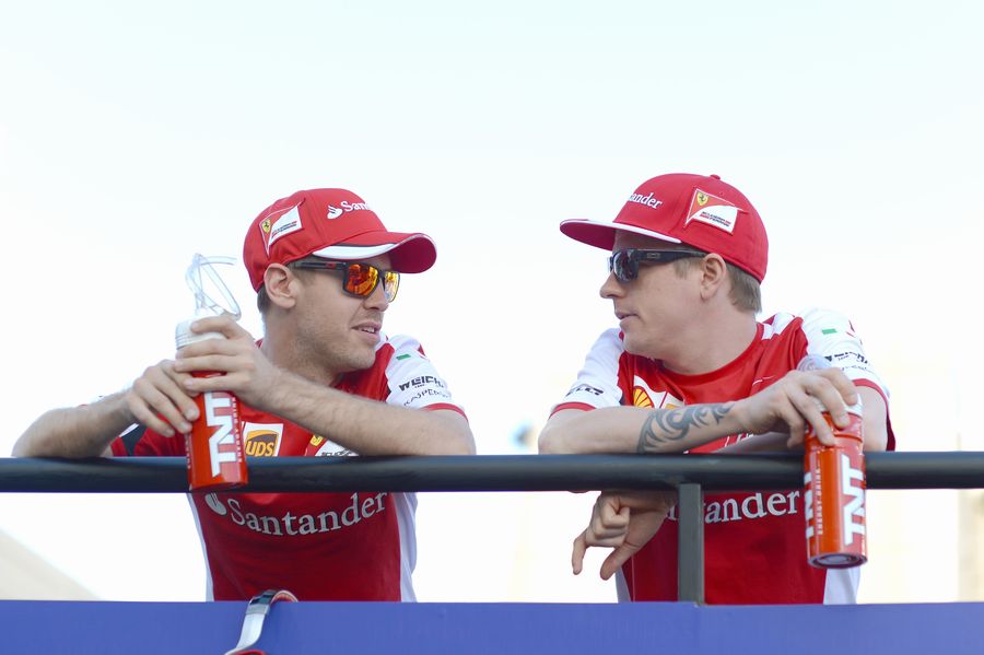 Sebastian Vettel and Kimi Raikkonen enjoy the drivers parade