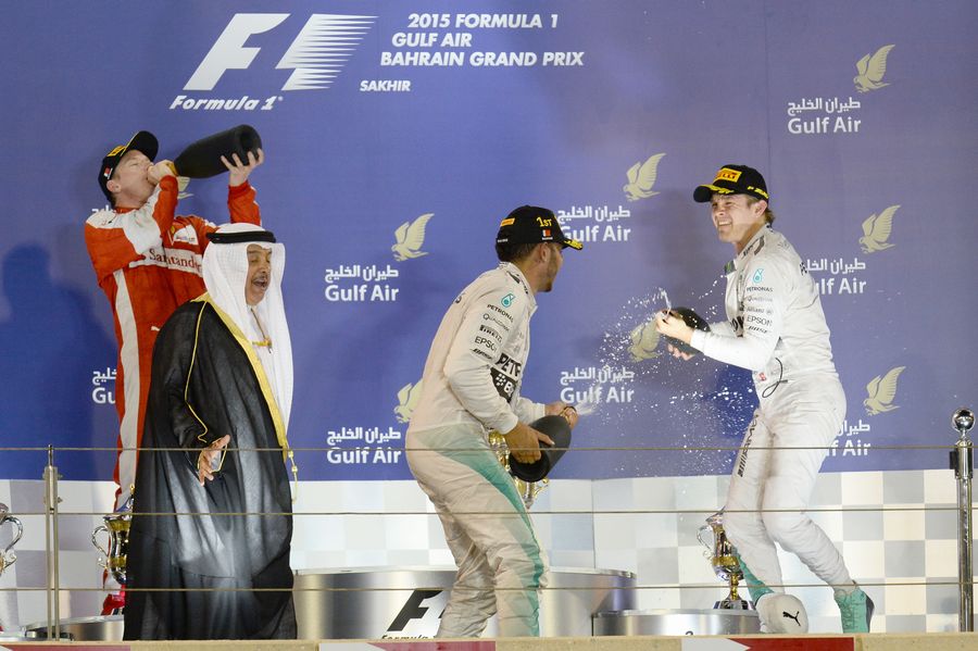 Nico Rosberg congratulates Race-winner Lewis Hamilton on the podium