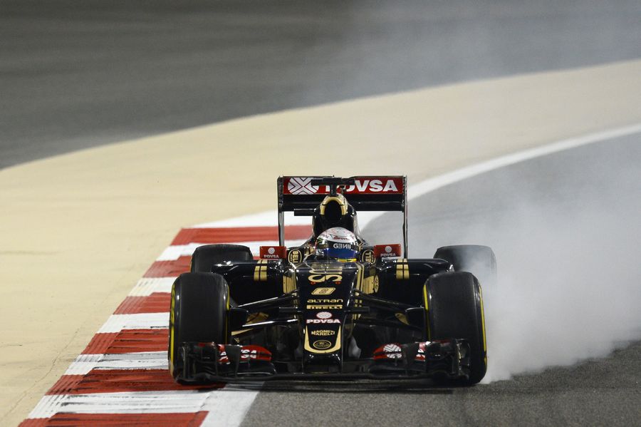 Romain Grosjean locks up in the Lotus