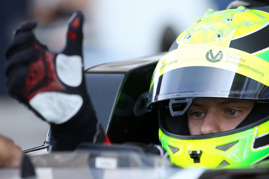 Mick Schumacher looks on from the cockpit