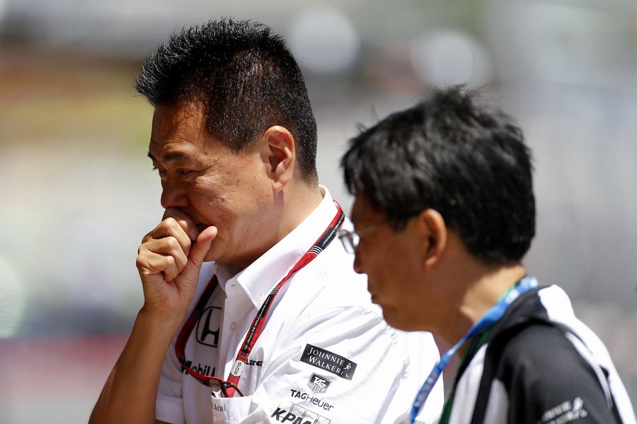 Yasuhisa Arai Head of Honda Motorsport looks on in the McLaren garage