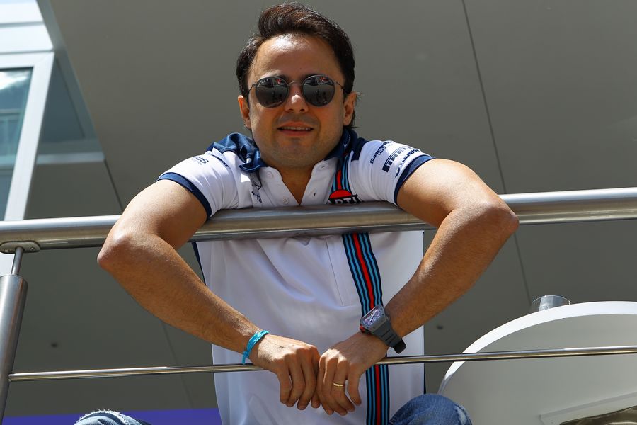Felipe Massa relaxes in the paddock