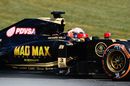 Romain Grosjean on track in the Lotus