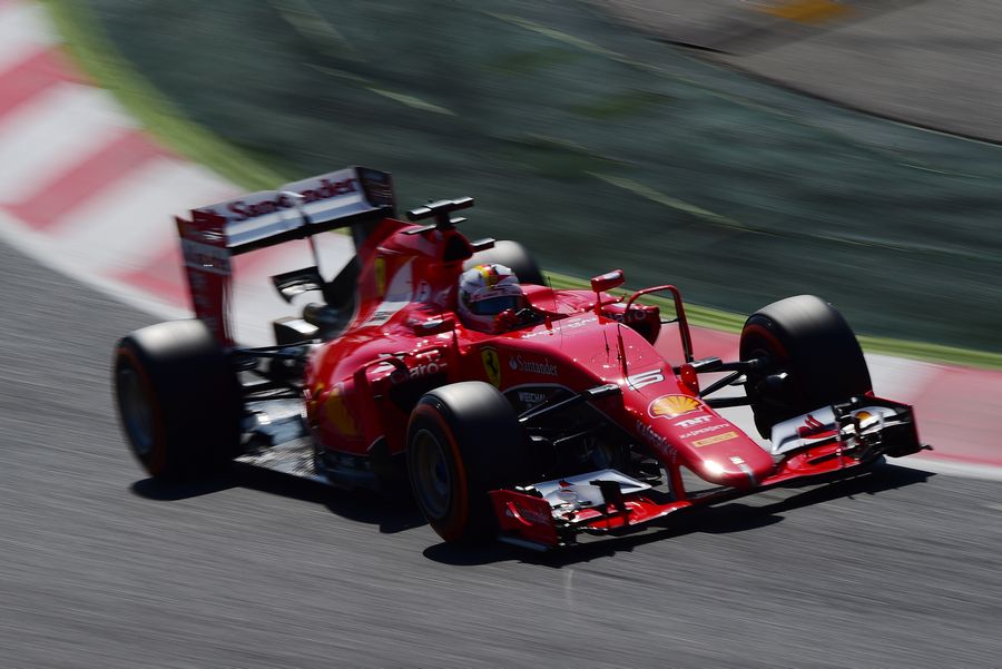 Sebastian Vettel puts the SF15-T through its paces during FP3