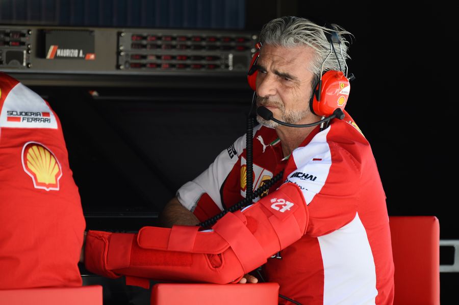 Maurizio Arrivabene watches on from the team pit wall