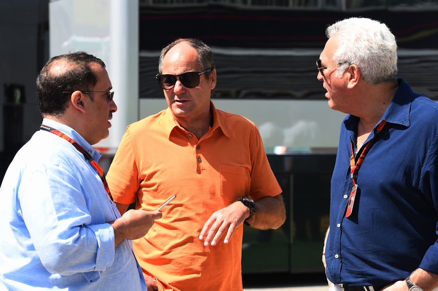 Gerhard Berger chats with Sheikh Mohammed bin Essa Al Khalifa and Lawrence Stroll 