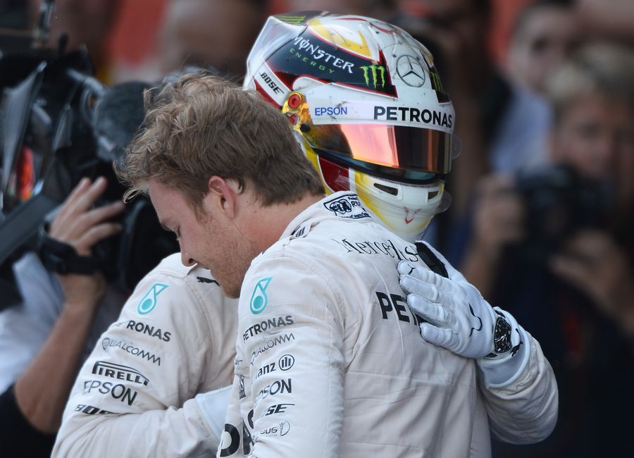 Lewis Hamilton congratulates his team-mate and the race winner  Nico Rosberg 