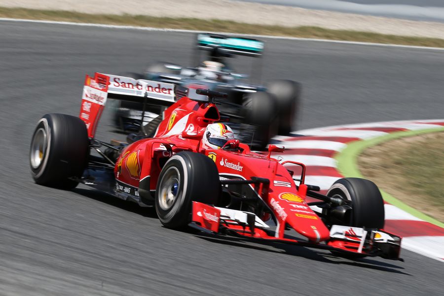 Sebastian Vettel leads Lewis Hamilton in the first part of race