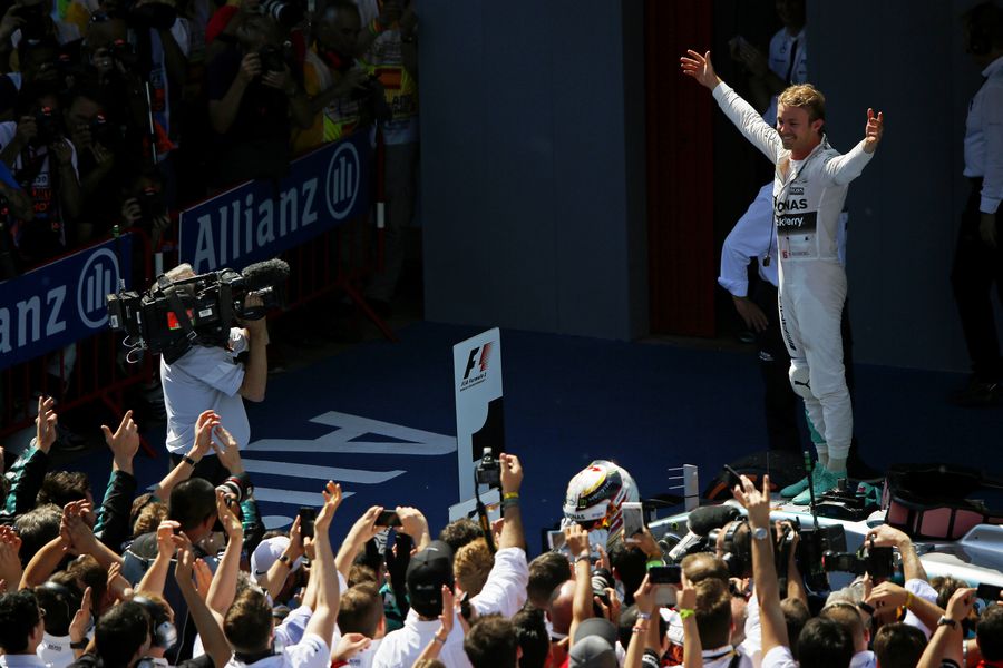 Race winner Nico Rosberg cereblates in the parc ferme