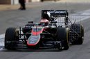 Jenson Button leaves the pit lane decked out with aero sensors