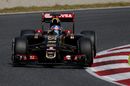 Jolyon Palmer rounds the apex in the Lotus