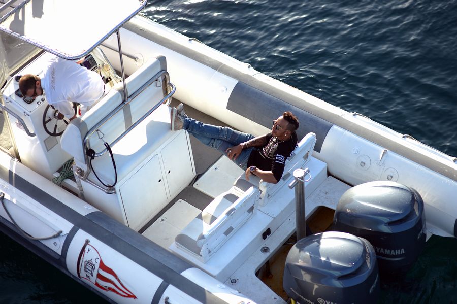 Lewis Hamilton relaxes on the boat