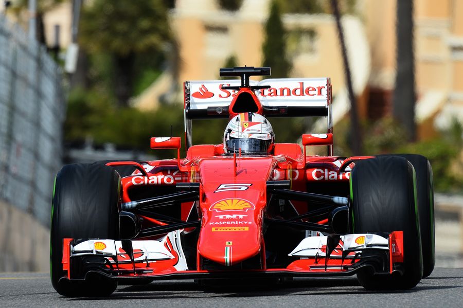 Sebastian Vettel completes an installation lap on intermediate tyres