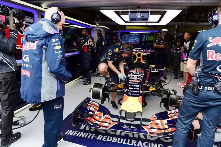 Adrian Newey inspects the RB11 in the Red Bull garage