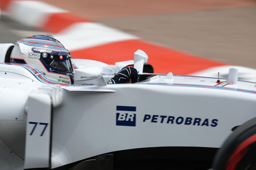 Valtteri Bottas cranks on the steering lock in the Williams
