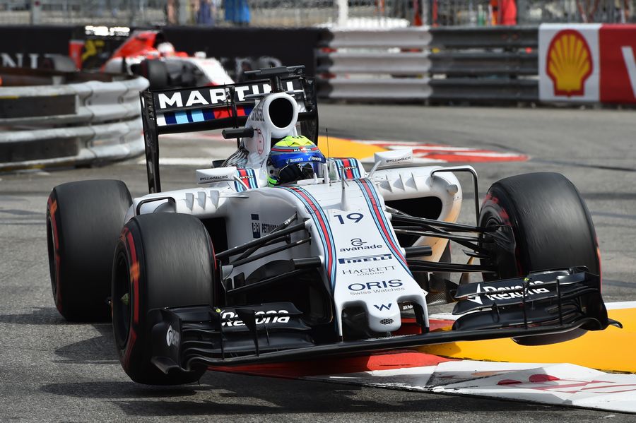 Felipe Massa bounces over a kerb